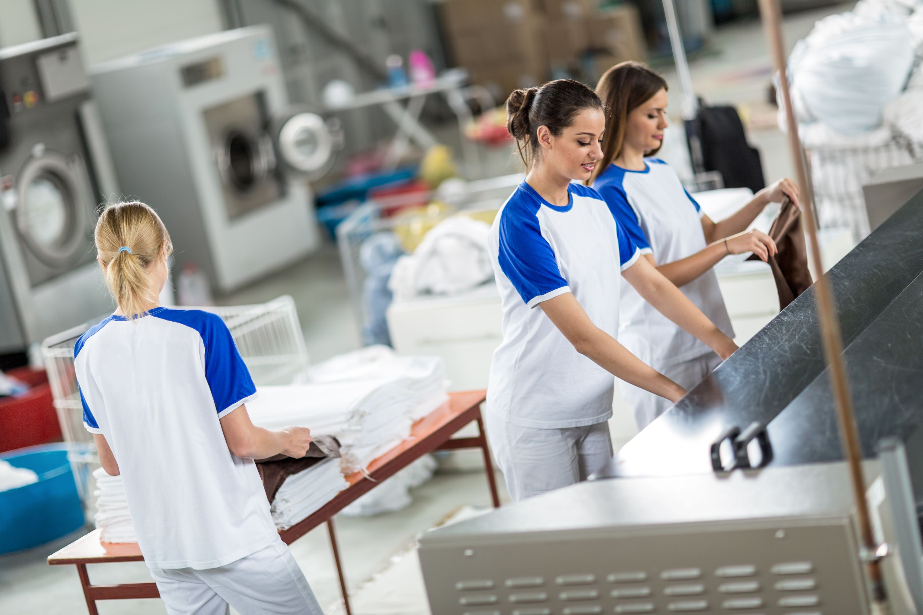 Laundry Workers Shutterstock 481574569